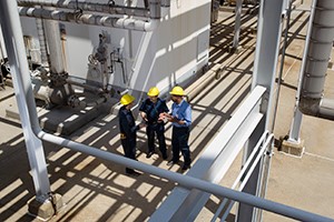 Workers looking at infastructure 
